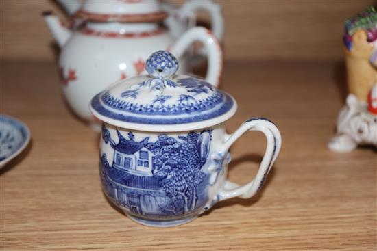 An 18th century Chinese export teapot, two tea bowls, custard cup another teapot Tallest teapot H.15cm